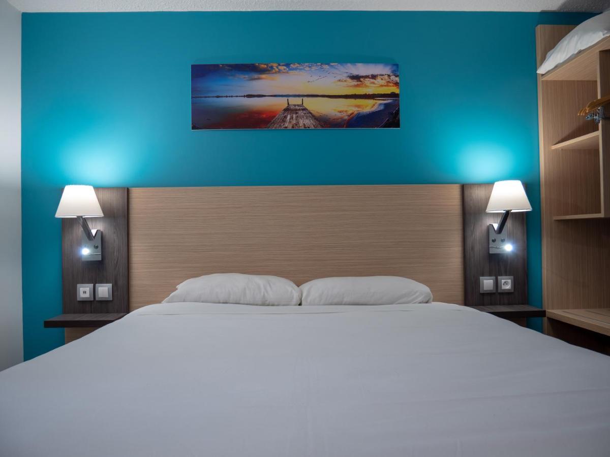 Contact Hotel Restaurant Bleu France - Eragny Cergy Εξωτερικό φωτογραφία